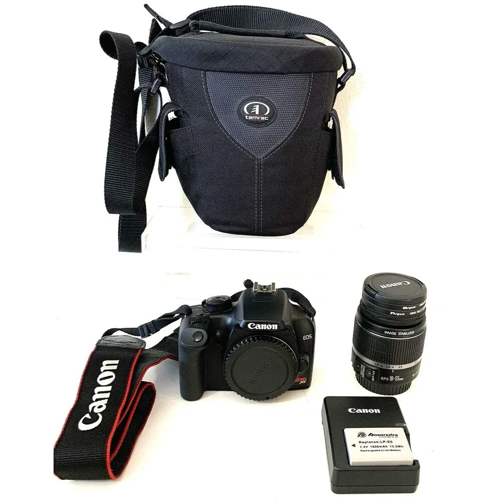 Canon EOS Rebel XS 10.1MP DSLR Camera w/8-55mm Lens Charger Bag Battery &LensPen